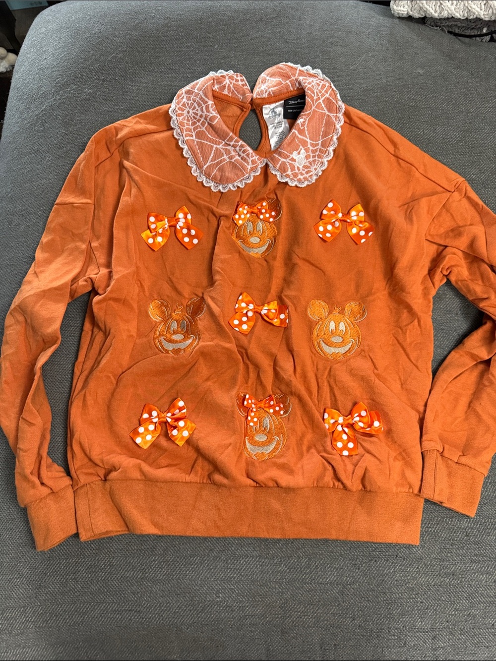 Her Universe Orange Crewneck Sweater with White Lace Collar and Polka Dot Bows